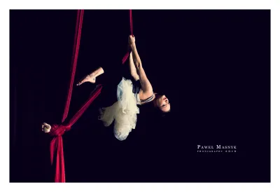 sensual girl hanging on a sash