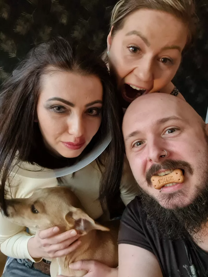 Group having fun with a dog