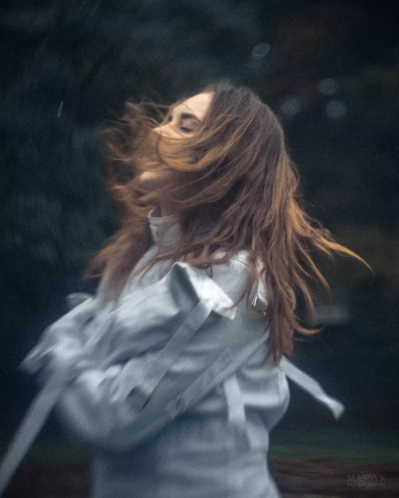  A beautiful woman in a straitjacket. Portrait