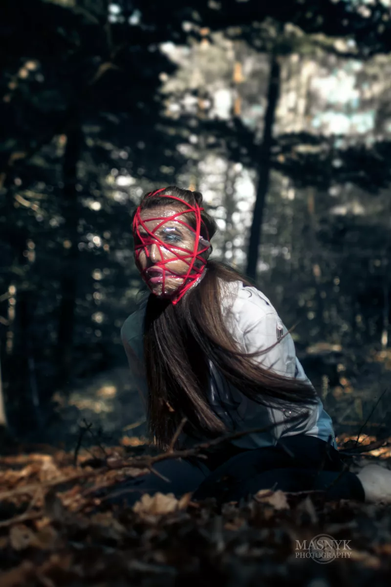  Face wrapped with rope and foil. photo horror