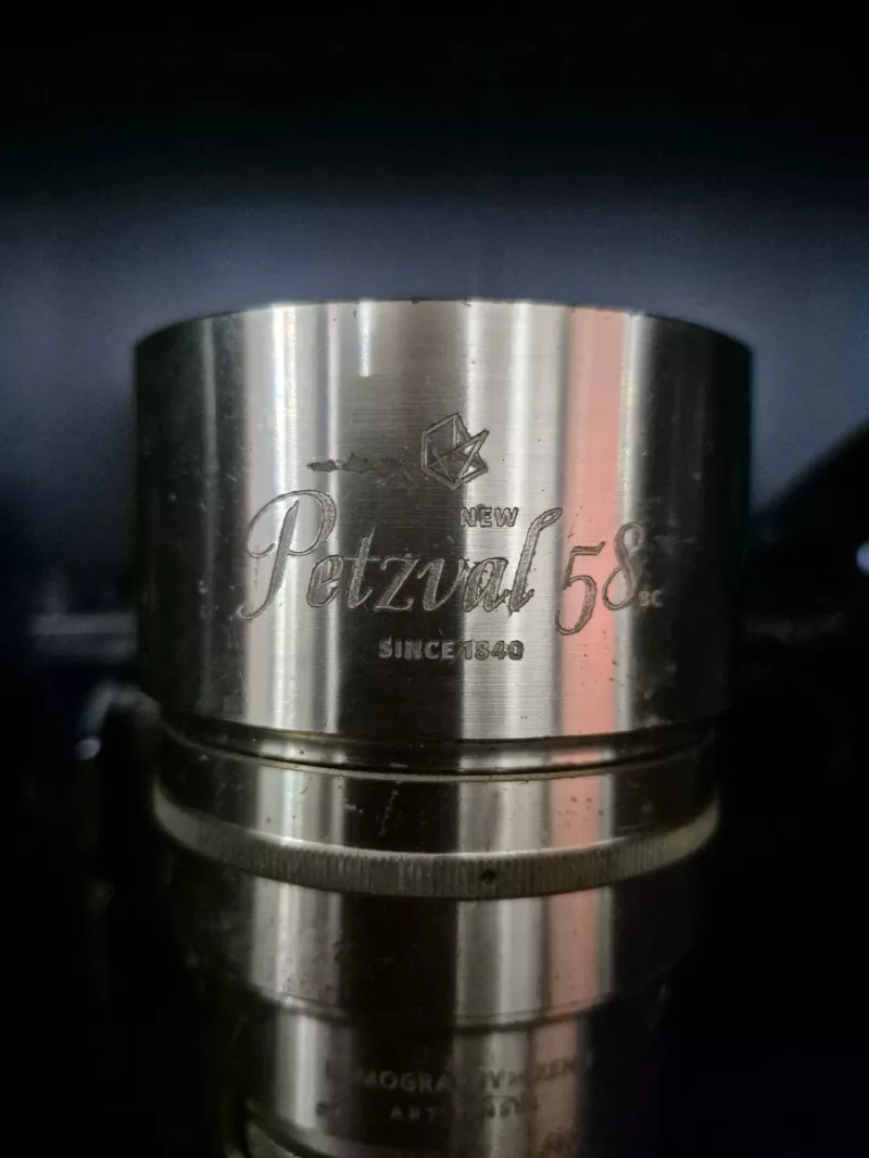 Close-up of Petzval 58mm lens with engraving