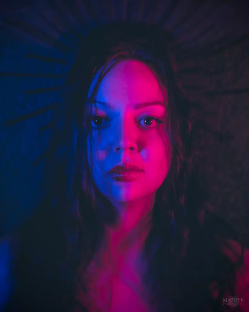  Face illuminated by two colors - a spectrum of opposites