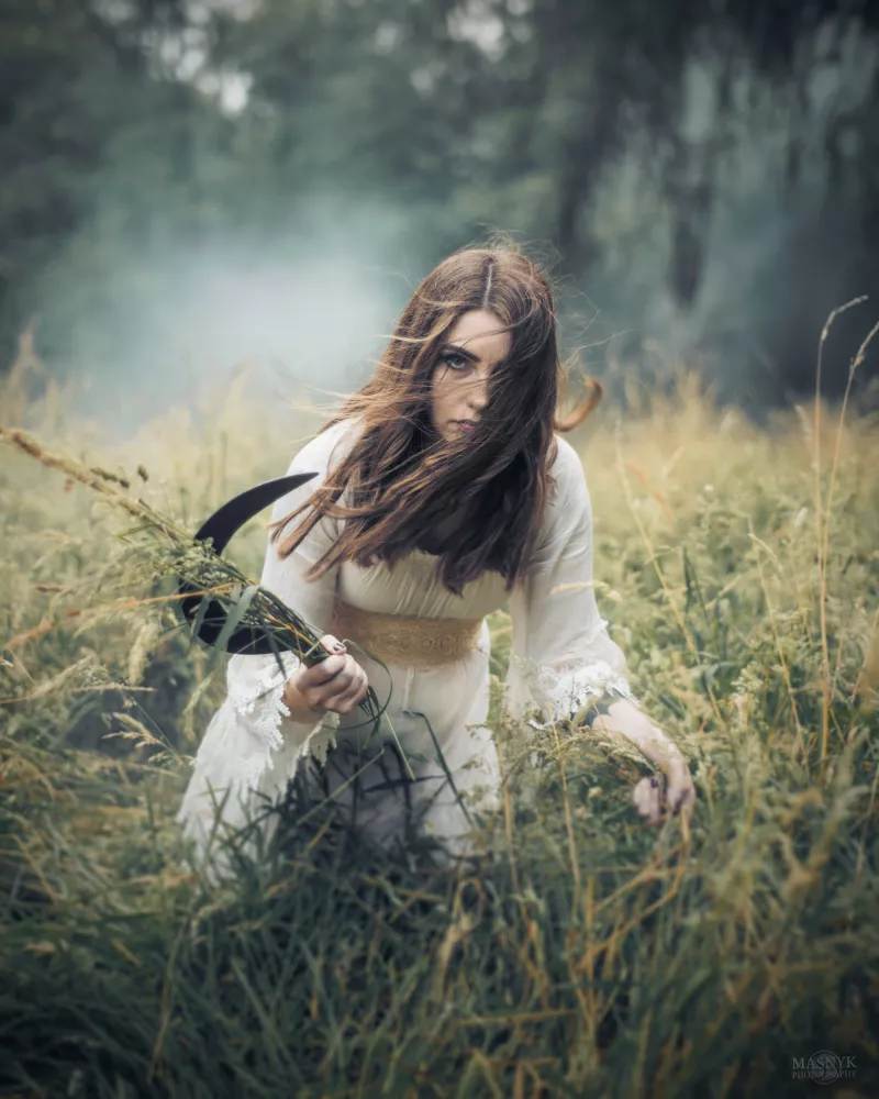 Slavic mythological figure Poludnica in a field