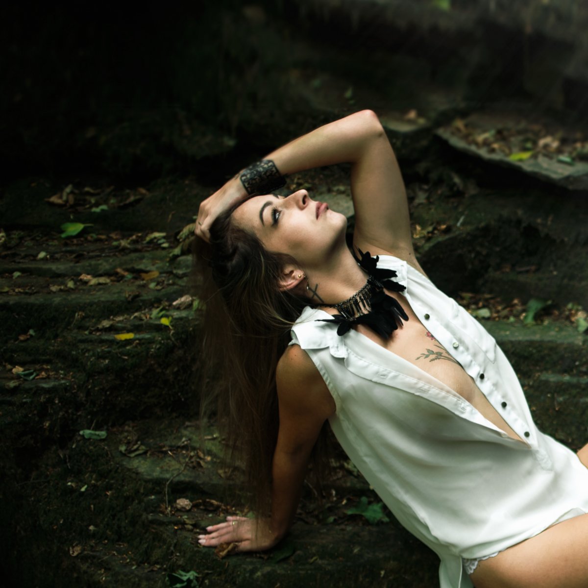 Woman posing in a mountain ravine